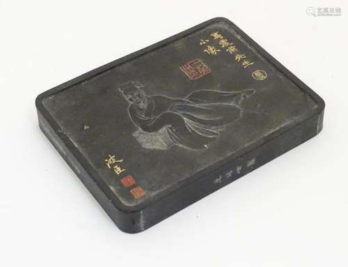 A Chinese ink slab decorated with gilt and red Chinese