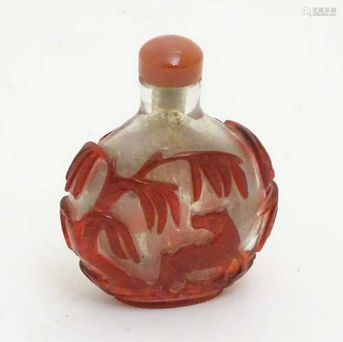 A Chinese overlaid glass snuff bottle with image in red