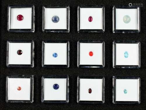 Lot with 12 boxes loose coloured stones of the'Gem