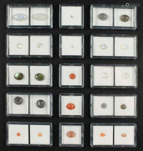 Lot with 15 boxes loose coloured stones of theGEM