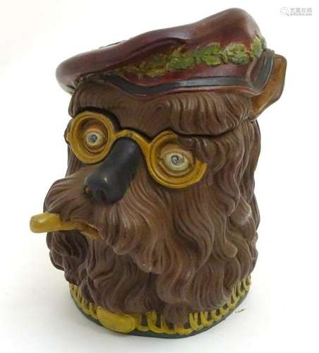 A terracotta polychromed novelty jar modelled as a