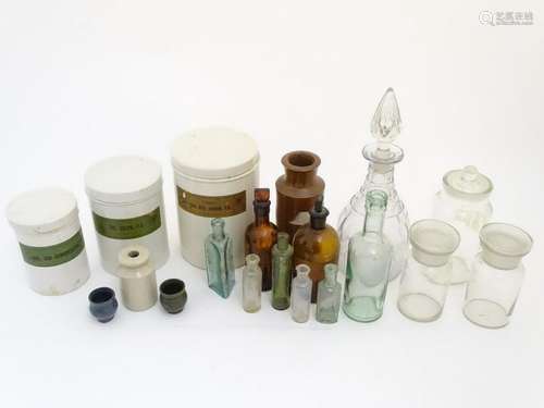 Medicine bottles: a quantity of glass bottles and