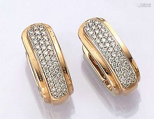 Pair 14 kt gold hoop earrings with brilliants