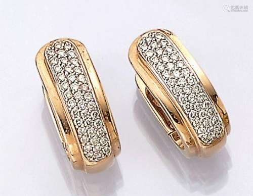 Pair 14 kt gold hoop earrings with brilliants