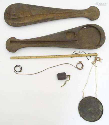 A set of opium scales with a bone (graduated) shaft,