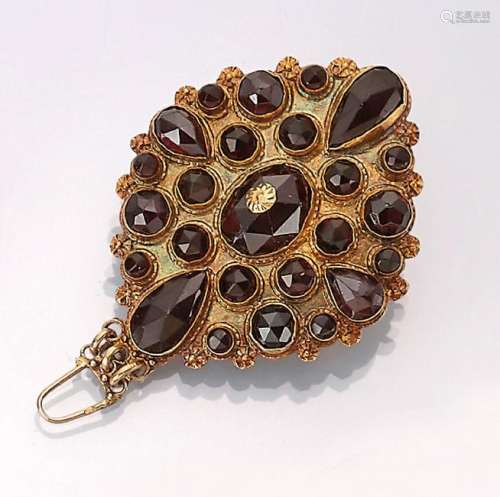 14 kt gold pendant with garnets