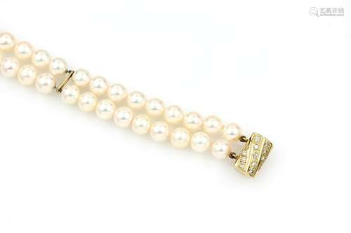 18 kt gold 2-rowed pearl bracelet with brilliants