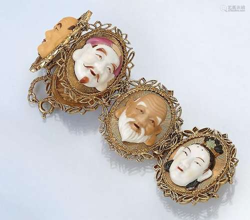 18 kt gold bracelet with masks