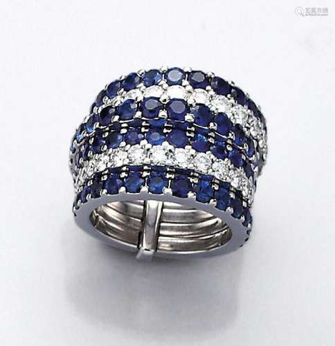 6-part 18 kt gold ring with sapphires and brilliants