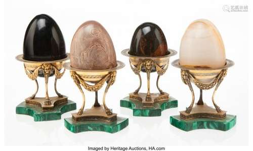 25102: A Set of Four Semi-Precious Stone Eggs on Gilt M