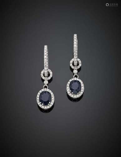 Two Burma sapphire and diamond white gold pendant