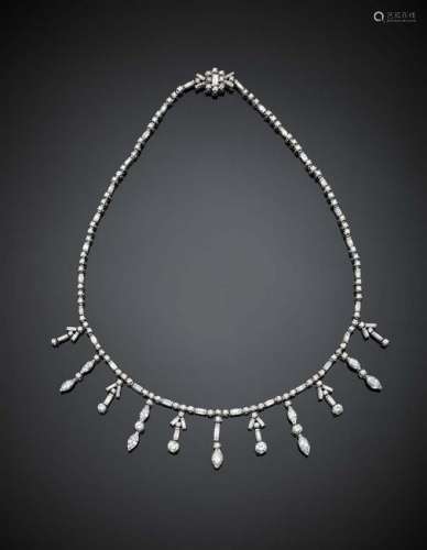 Round and baguette diamond platinum necklace accented