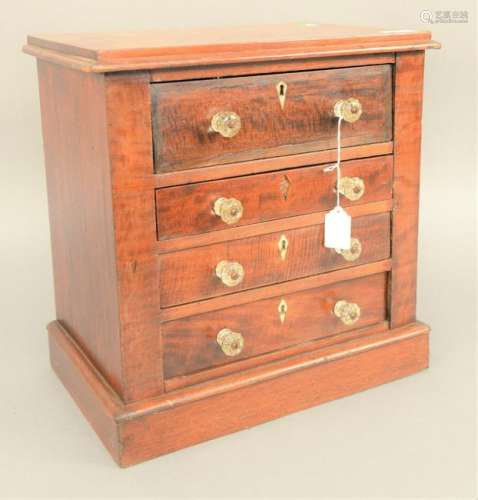 Diminutive four drawer chest. ht. 16 in., wd. 15 1/2