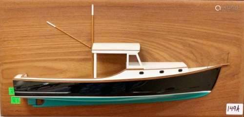 Half hull model of down east fishing boat on teak panel