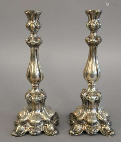 Pair of Continental silver candlesticks, touch marked