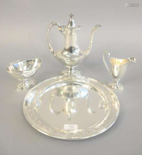 Four piece sterling silver tea set. teapot ht. 10 1/2