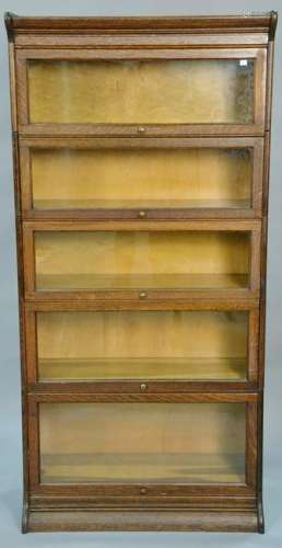 Oak barrister five section bookcase. ht. 71 in., wd. 34