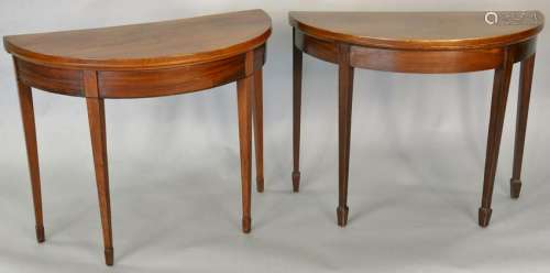 Two George IV demilune game table with felt inserts,
