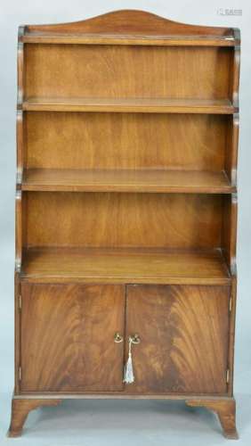 George IV style mahogany bookcase with two door base,