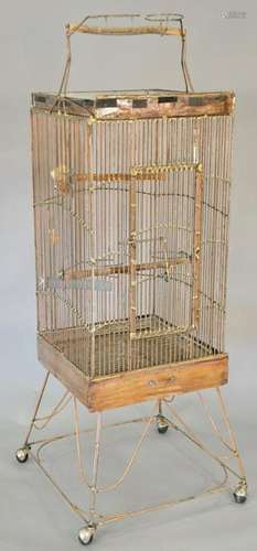 Copper parrot cage with perch. ht. 66 in., top: 20