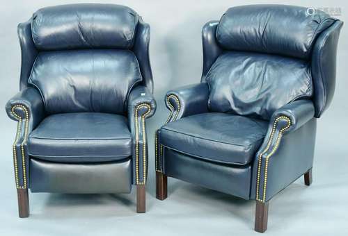 pair of Hancock & Moore leather reclining chairs, dark