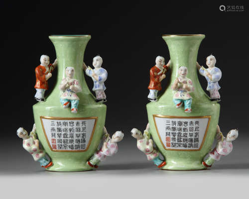 A pair of Chinese famille rose boys wall vases