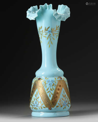 A pale blue gilt decorated bohemian glass vase