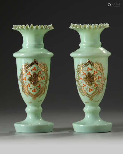 A pair of mint-green French glass vases