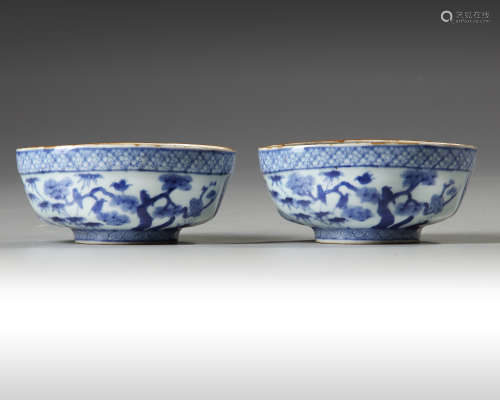A pair of Japanese blue and white oval shaped bowls