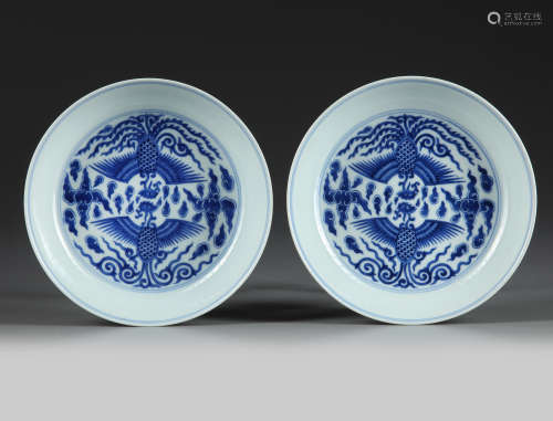 A pair of Chinese blue and white 'phoenix' dishes