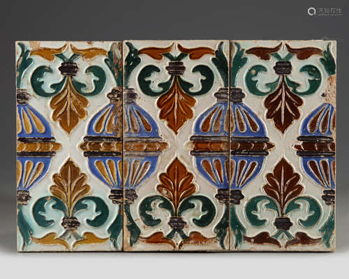 A set of three Spanish ceramic tin glazed wall tiles