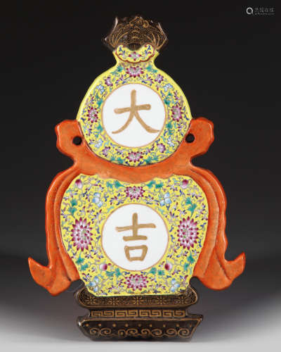A Chinese famille rose double gourd wall hanging