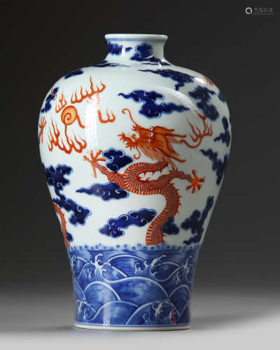 A Chinese coral-red decorated blue and white meiping vase