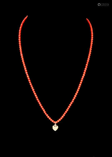 A Aka Level Red Coral Bead Necklace with a 14K Gold Heart Shape Pendant