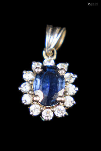 A Silver Set Sapphire Pendant with Splint