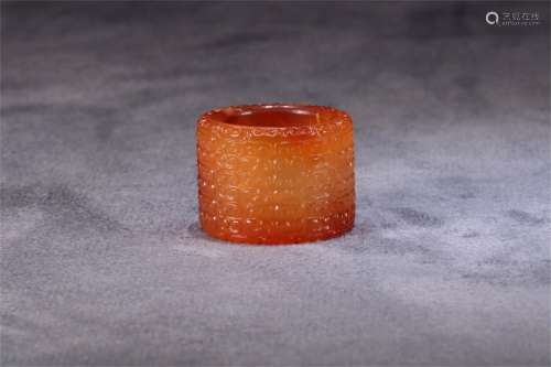 A Chinese Carved Agate Ring