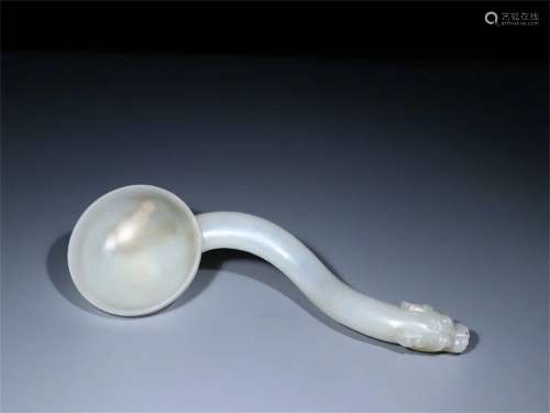 A Chinese Carved Jade Spoon