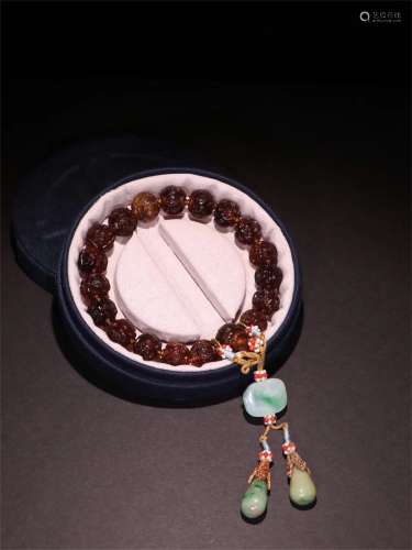 A Chinese Carved Amber Prayers Beads