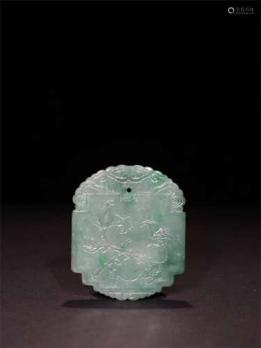 A Chinese Carved Jadeite Pendant