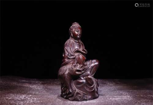 A Chinese Carved Zitan Figure of Buddha