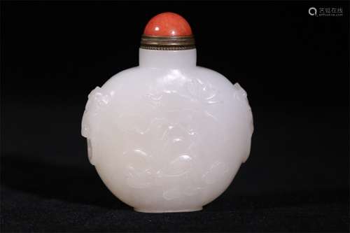 A Chinese Carved Jade Snuff Bottle