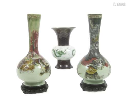 A Fukigawa vase together with a pair of enamelled bottle vases