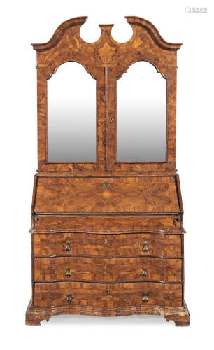 Probably Venetian, 18th century a North Italian walnut and crossbanded bureau cabinet