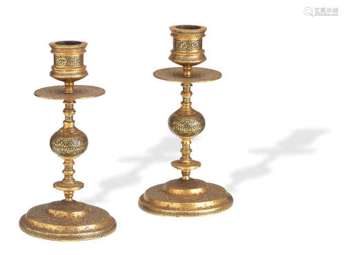 India, 19th century A pair of iron and gold koftgari candlesticks