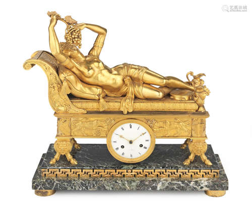 The movement numbered 9360, the dial signed 'A Paris'.  A fine and large early 19th century French Empire gilt bronze and verde antico mantel clock