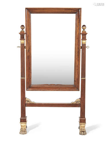 A North Italian mid-19th century walnut and parcel gilt cheval mirror