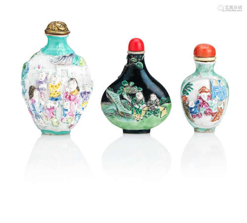 Qing Dynasty Three relief-moulded porcelain snuff bottles