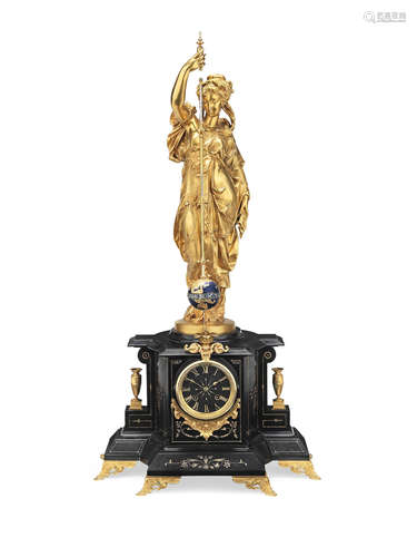 The bronze figure signed P. Machault fils. The movement marked with a star over an anchor and shield, numbered 11778.  A large and impressive late 19th century French gilt bronze rotary pendulum mystery clock