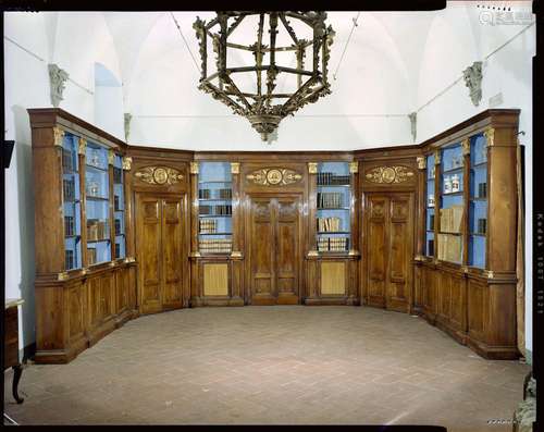 North Italian, 19th century An impressive complete walnut, carved giltwood and gilt bronze mounted library