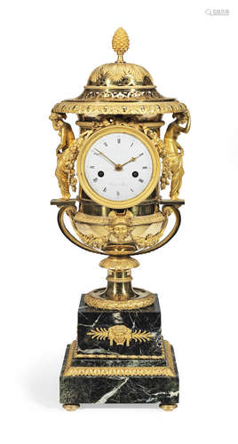 The dial signed Sirost, à Paris.  The model after Galle.  A fine early 19th century French ormolu and verde antico urn clock